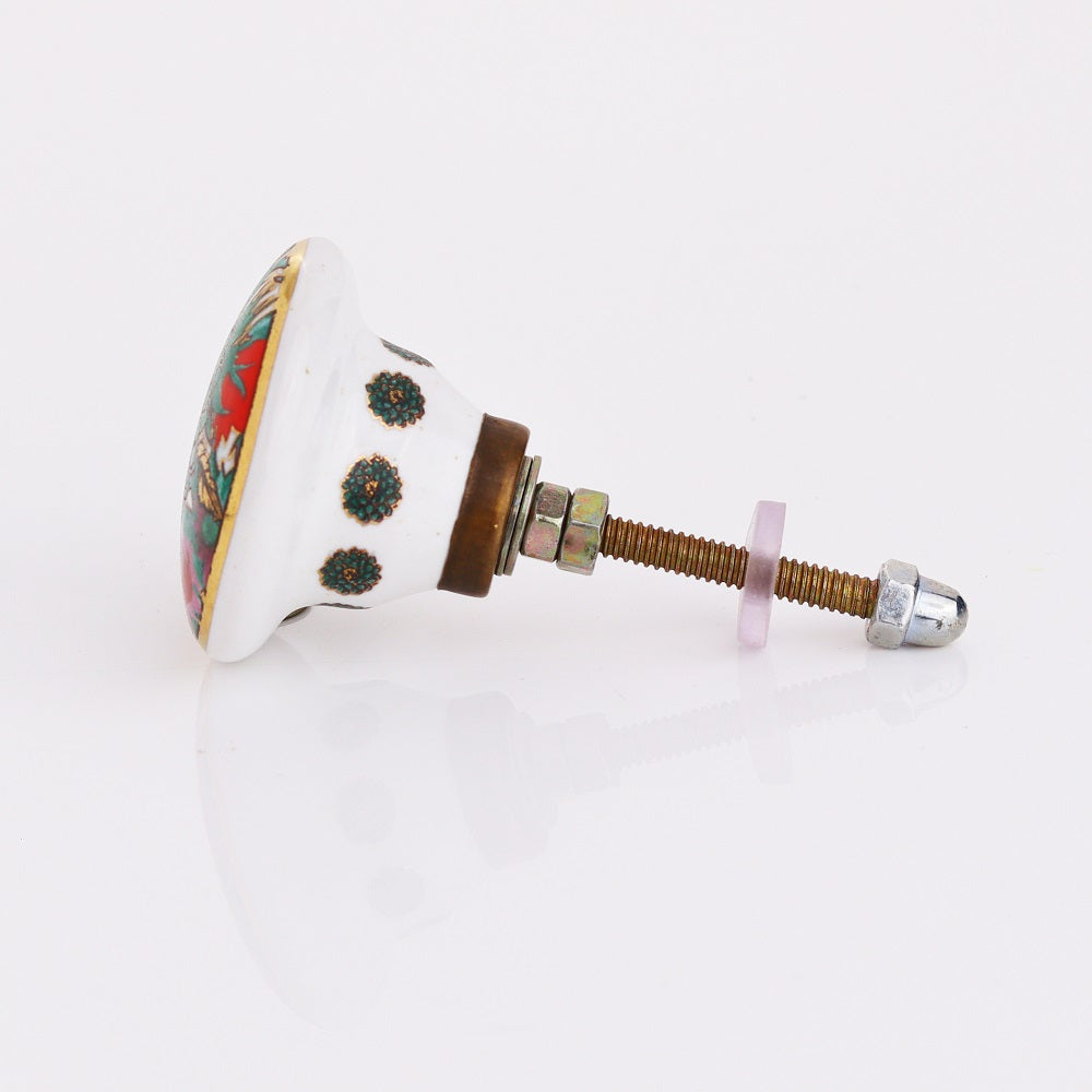 fargeglad keramikk knott dekorert med vakre tropiske planter i grønne og røde farger