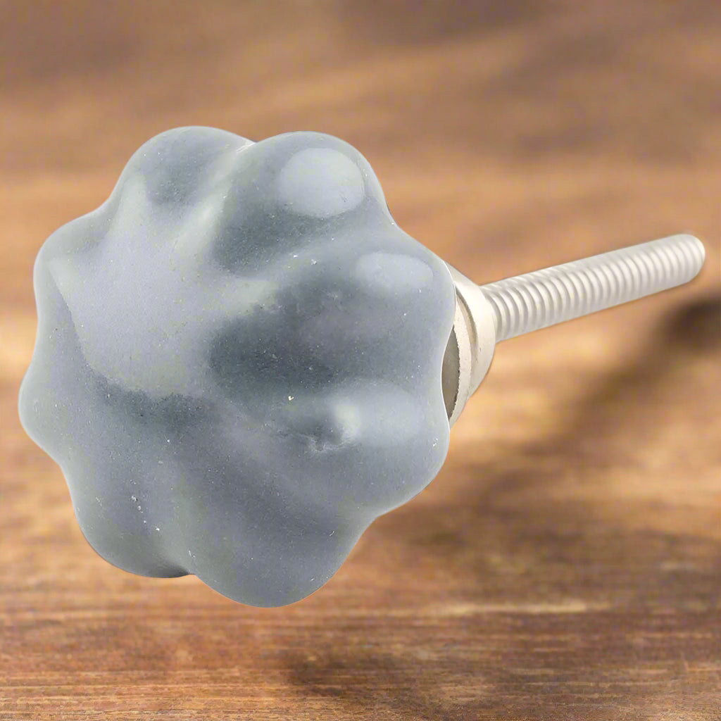 grå keramikk knott - bølgende form