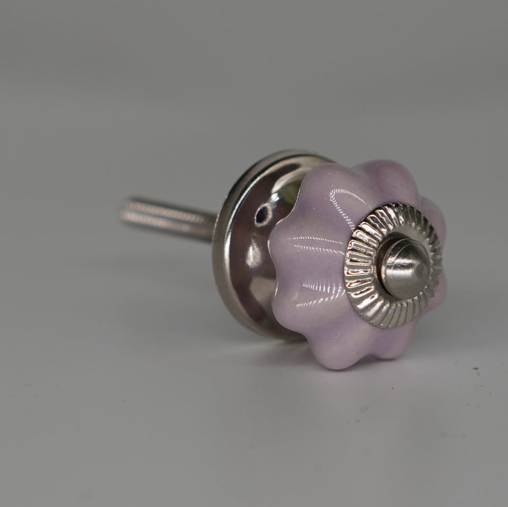 knott liten søt lilla rosa blomst formet