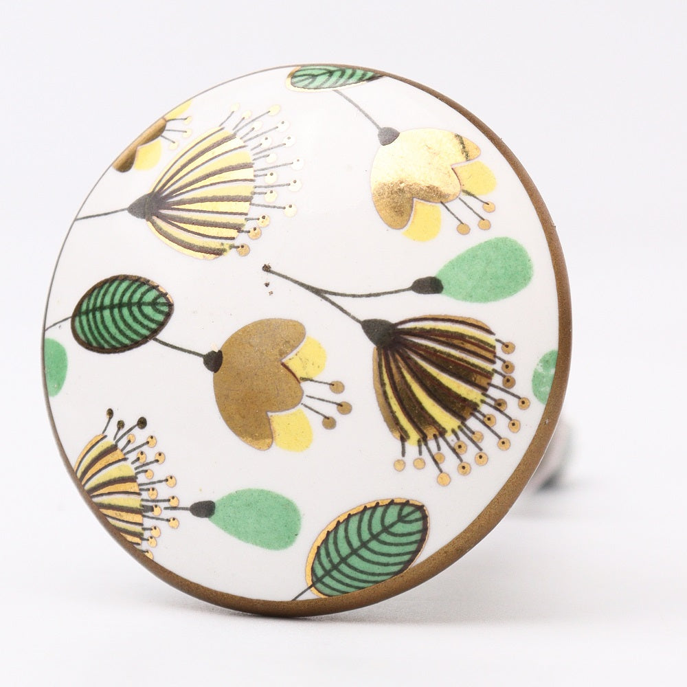 Porselenknott med håndmalt blomstermønster i grønt og gull