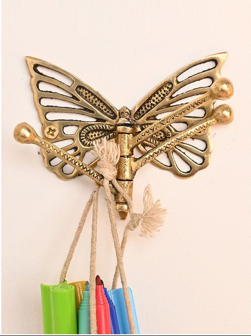 dekorativ knagg i messing med bevegelige armer