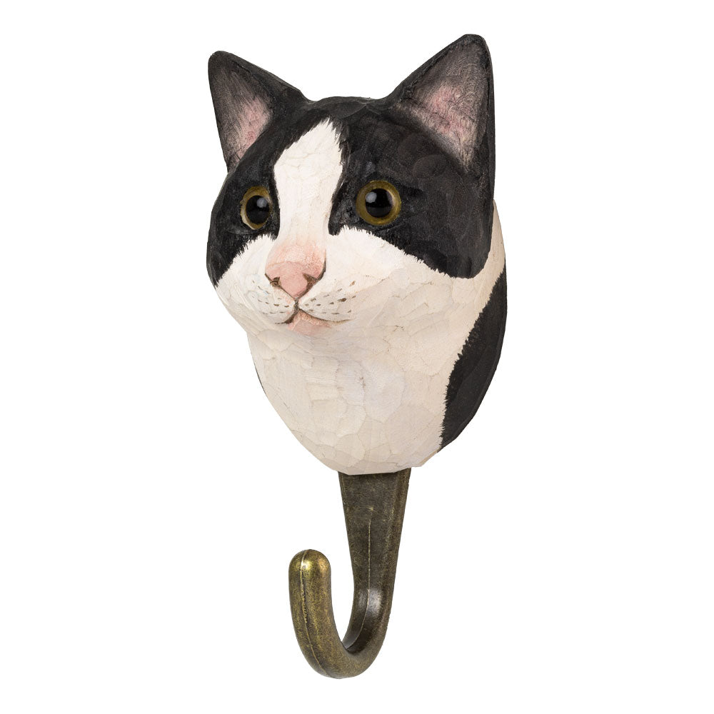 knagg i form av en svart hvit katt - fra wildlife garden